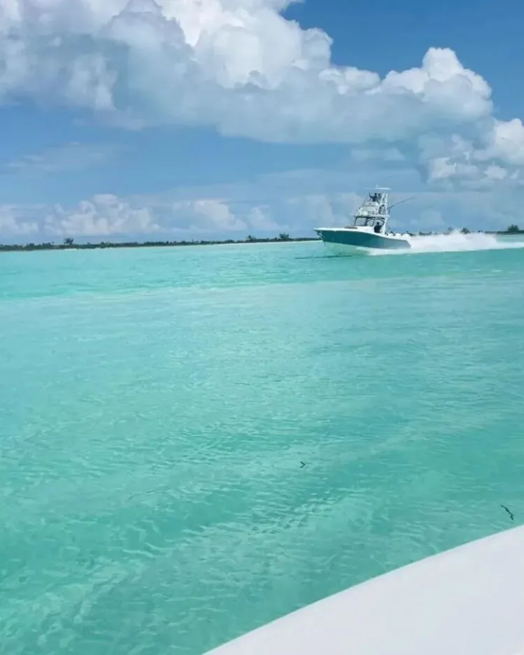 Clear turquoise water and a skiff in Exuma